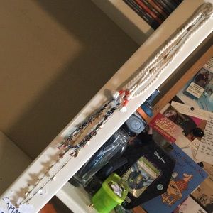 2 j.Crew necklaces—1 summery beaded, 1 gold leaves